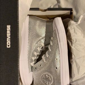 New silver aluminum Chuck Taylor 2 sz 7 Women’s